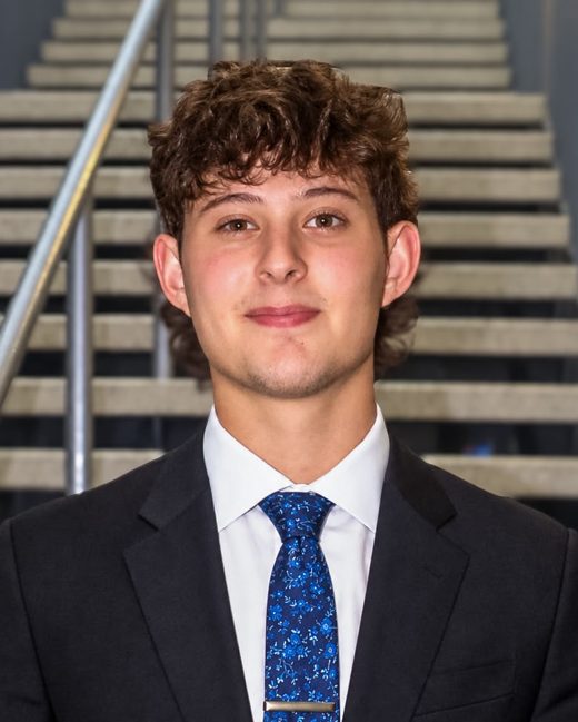Yuval Fefer in a navy suit