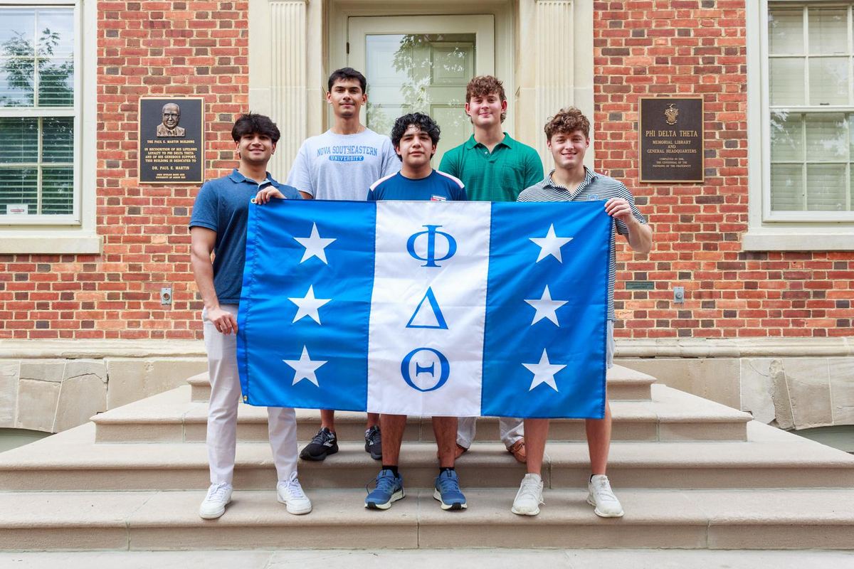With Phi Delta Theta brothers at the fraternity headquarters