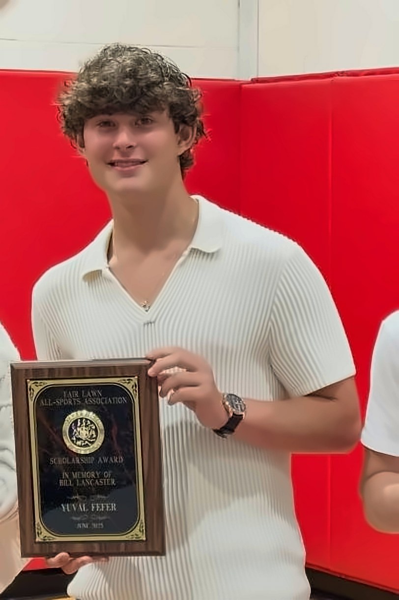 Yuval with the Bill Lancaster Memorial Award, the Fair Lawn All-Sports Association's $750 scholarship for athletic dedication, sportsmanship, academic commitment and contributions to the Fair Lawn athletic community